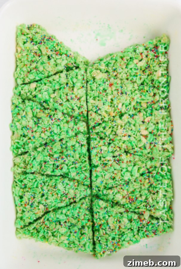 Yuletide Crispy Delights 10 Cutting Christmas Rice Krispie Treats into tree shapes