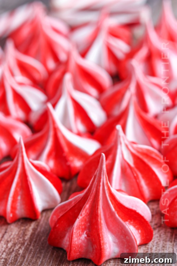 Effortless Meringue Clouds 20 Christmas meringues on a plate ready to serve