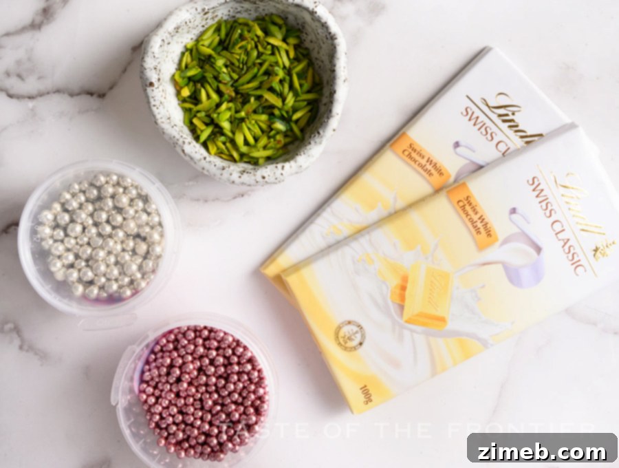 Ingredients for decorating Christmas Pistachio Cookies: white chocolate, pistachios, sugar pearls