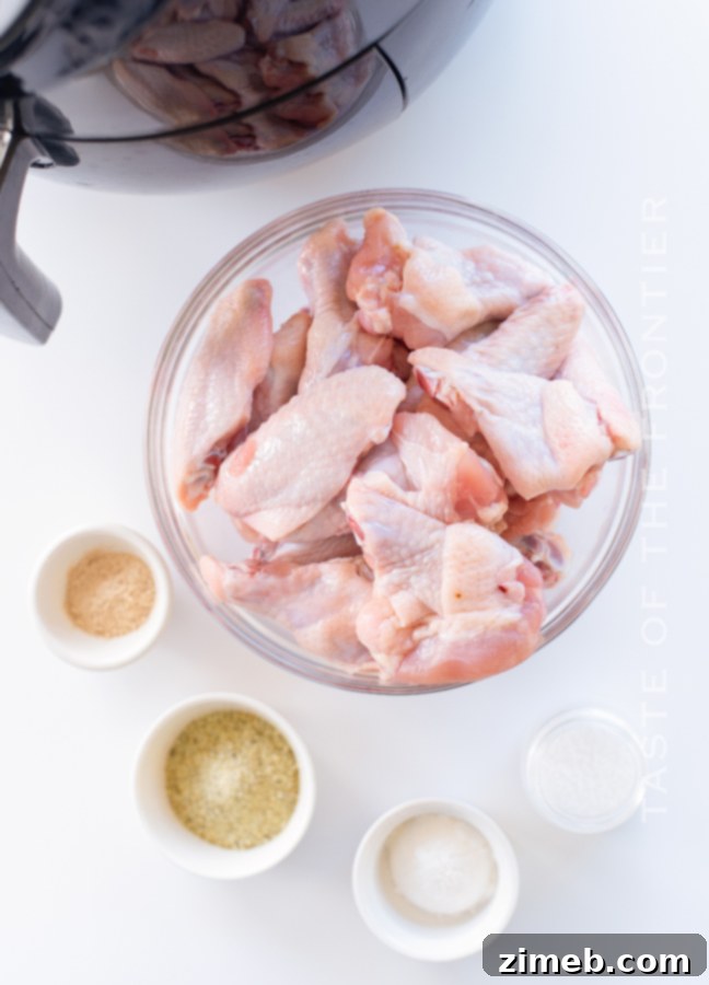 Air Fryer Lemon Pepper Wings 5 Ingredients for Air Fryer Lemon Pepper Wings laid out.