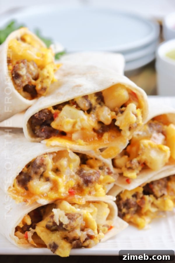 Sunrise Burrito Wraps 21 Easy breakfast burritos laid out on a serving platter.
