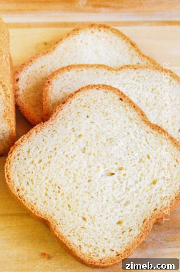 Perfect Bread Machine White Bread 4 Close-up of golden brown bread machine white bread.