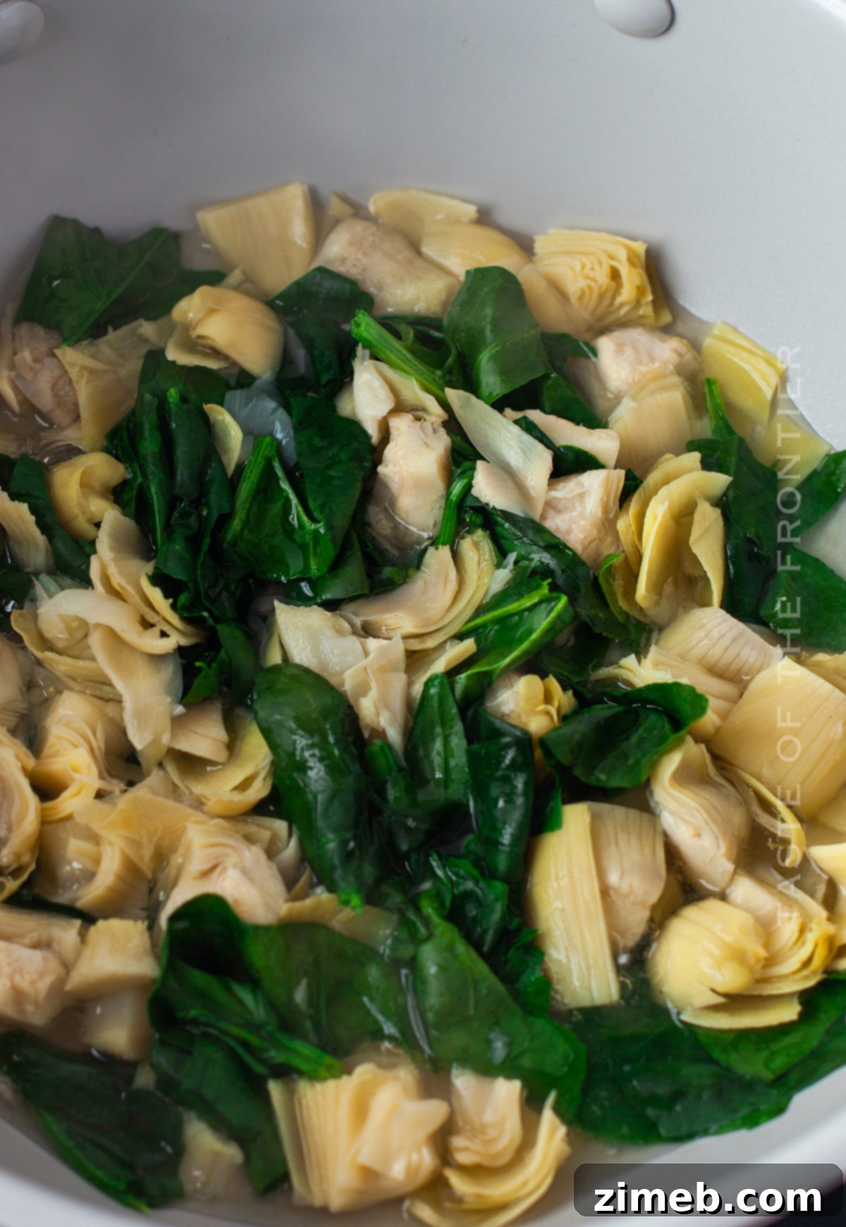 Creamy Spinach Artichoke Stuffed Mushrooms 7 boil the spinach and artichokes