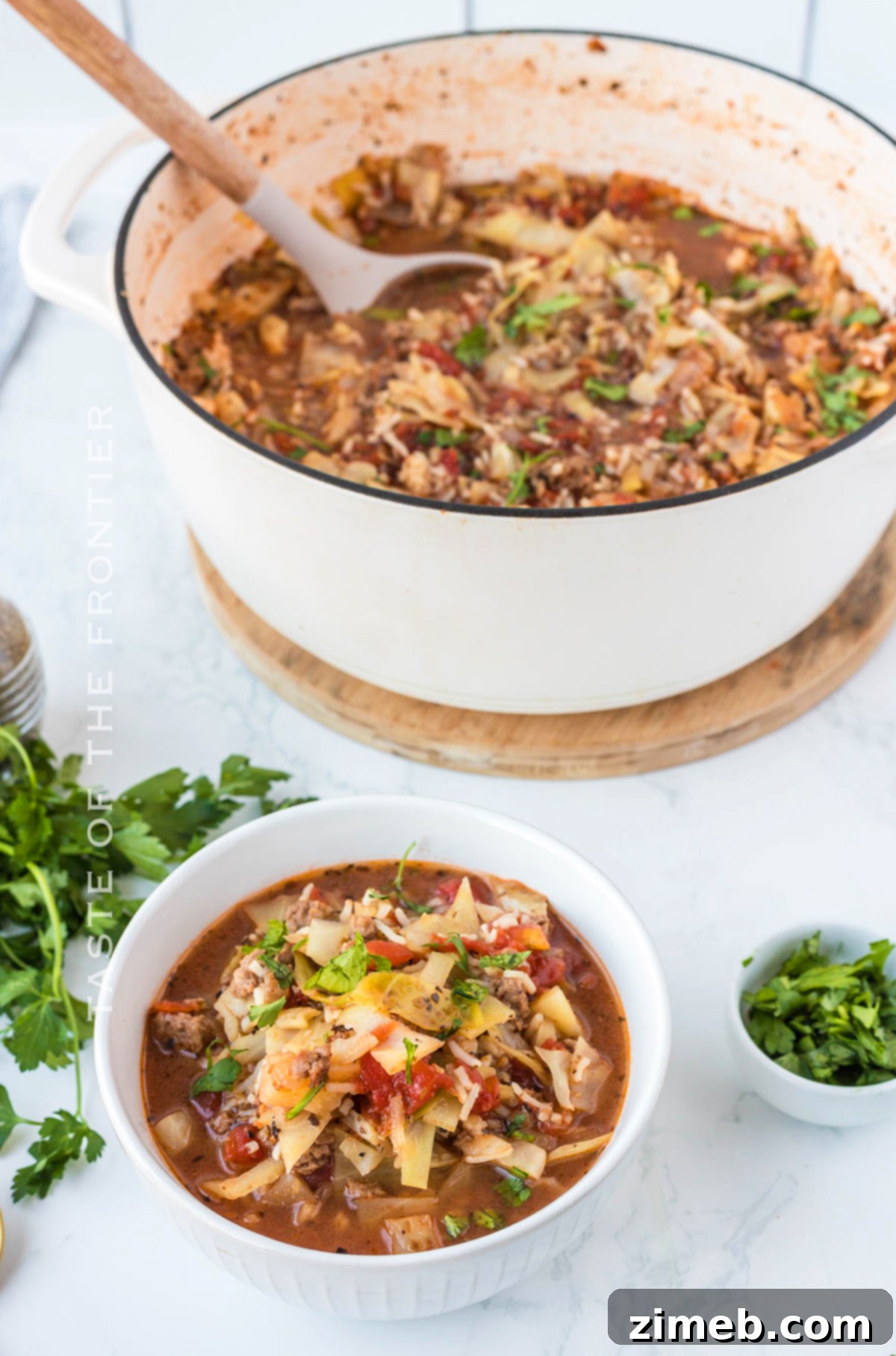 Stuffed Cabbage Soup 3 Warm winter dinner soup featuring cabbage and beef, served in a ceramic bowl.
