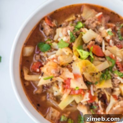 Stuffed Cabbage Soup 29 Hearty Cabbage Roll Soup simmering with fresh vegetables.