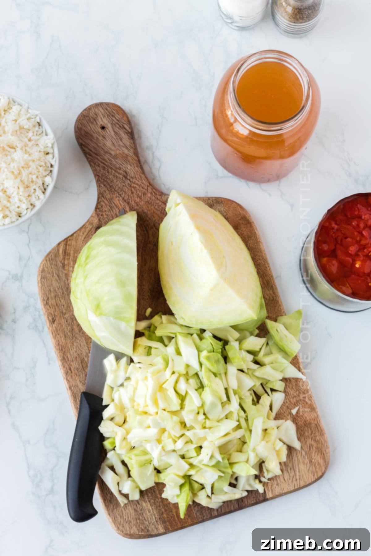Stuffed Cabbage Soup 6 Step-by-step image showing how to make Cabbage Roll Soup, with ingredients simmering.