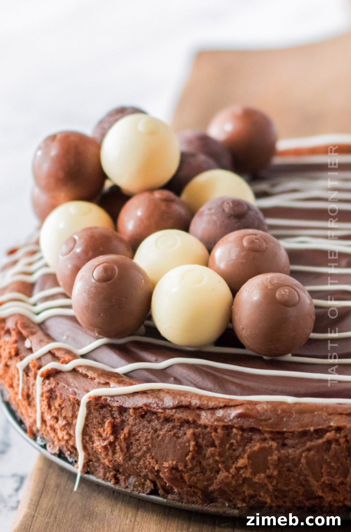 Chocolate Truffle Cheesecake with a smooth, dark chocolate topping.