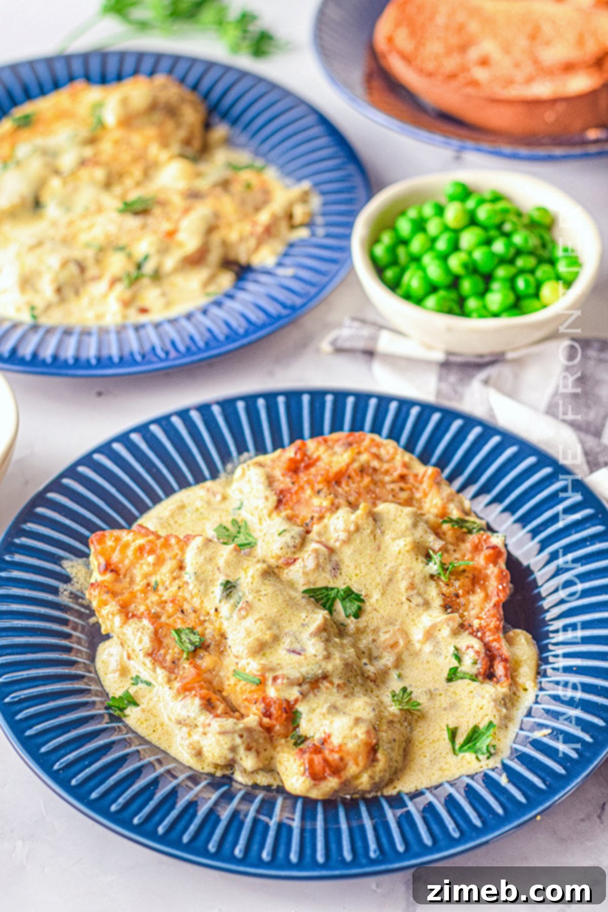 Dreamy Creamy Air Fryer Garlic Chicken 3 Air Fryer Creamy Garlic Chicken dinner served with fresh parsley.