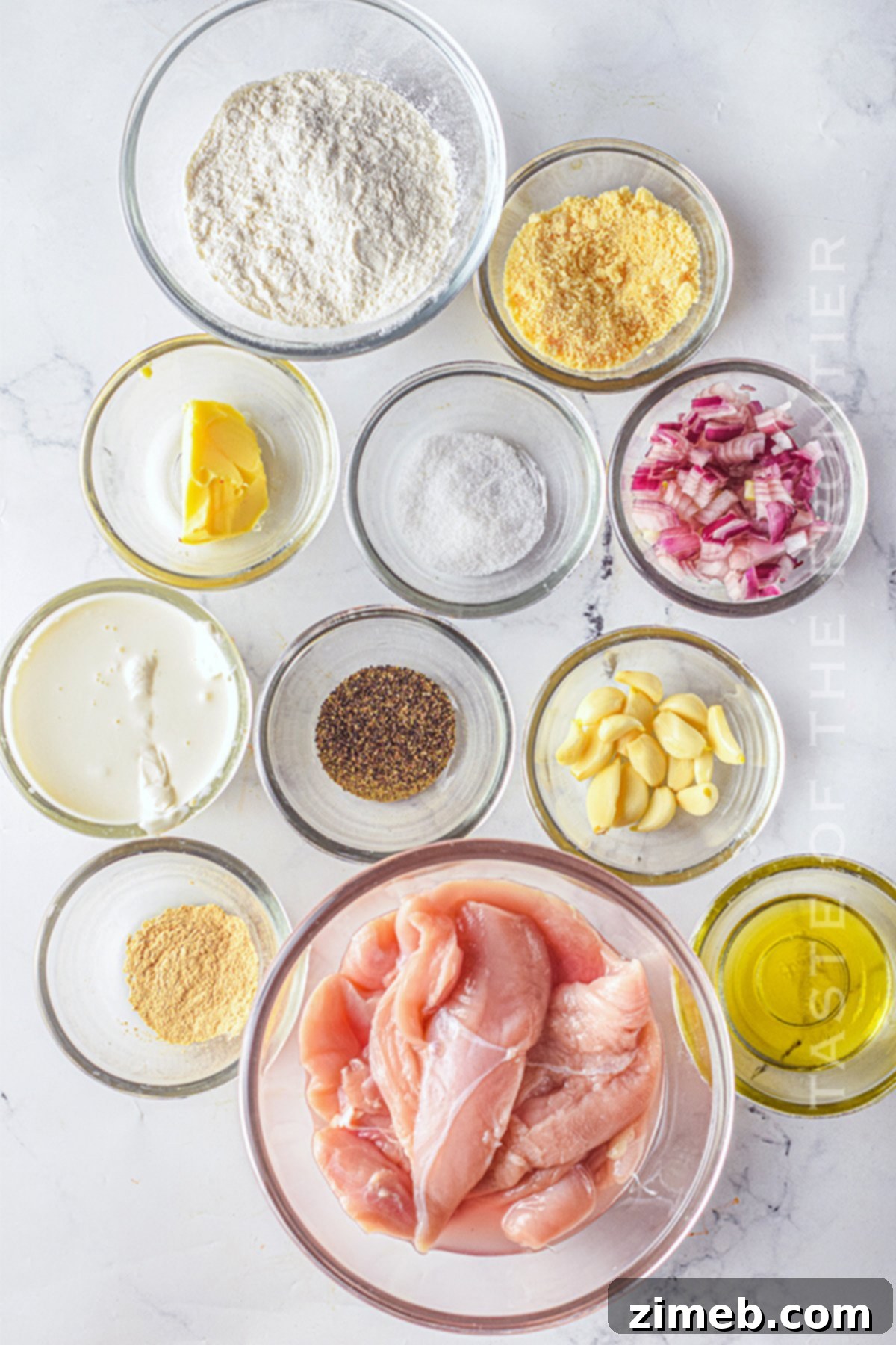 Dreamy Creamy Air Fryer Garlic Chicken 5 Ingredients for Creamy Garlic Chicken, including fresh garlic and herbs.