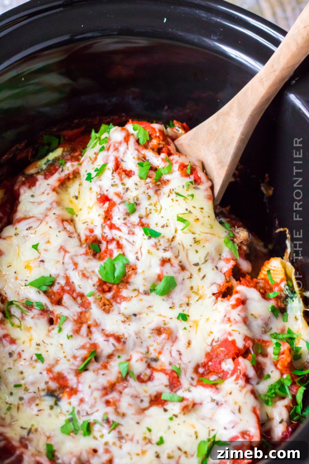 Set It and Forget It Stuffed Shells 15 Melted cheese pasta shells dinner, glistening with sauce