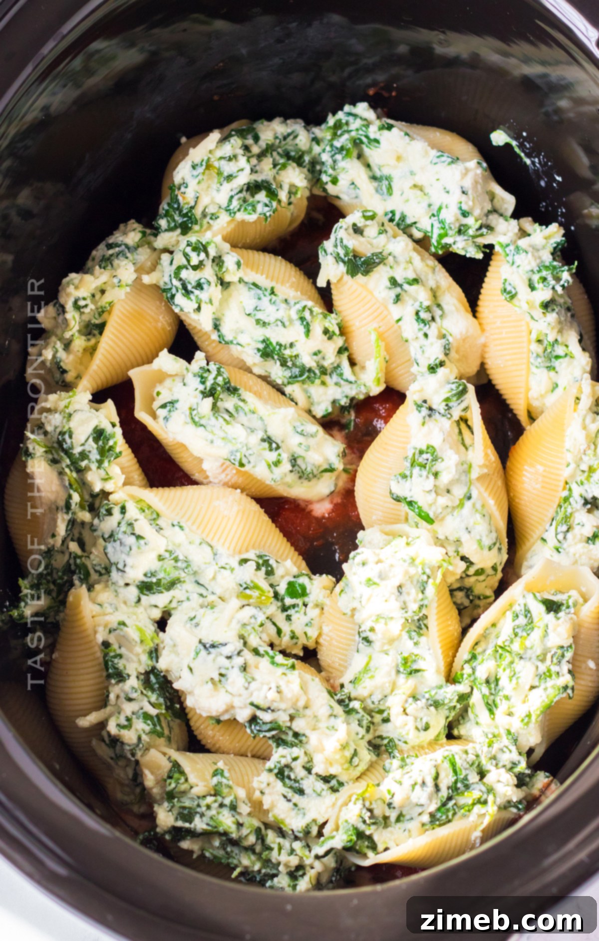 Set It and Forget It Stuffed Shells 6 Making stuffed shells in the crockpot, showing the final cooked dish