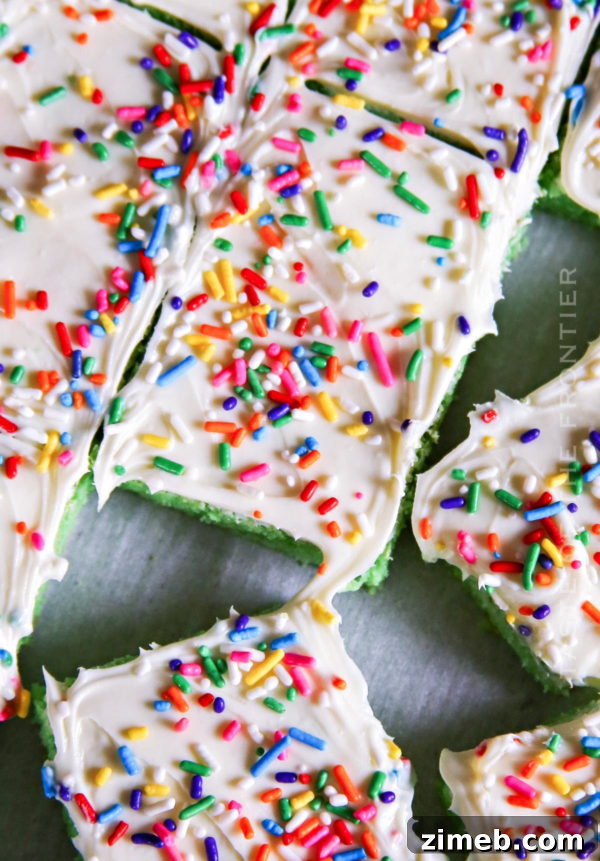 Lucky St Patricks Day Cake Mix Cookie Bars 4 Frosted rainbow cookie bars for St. Patrick's Day.