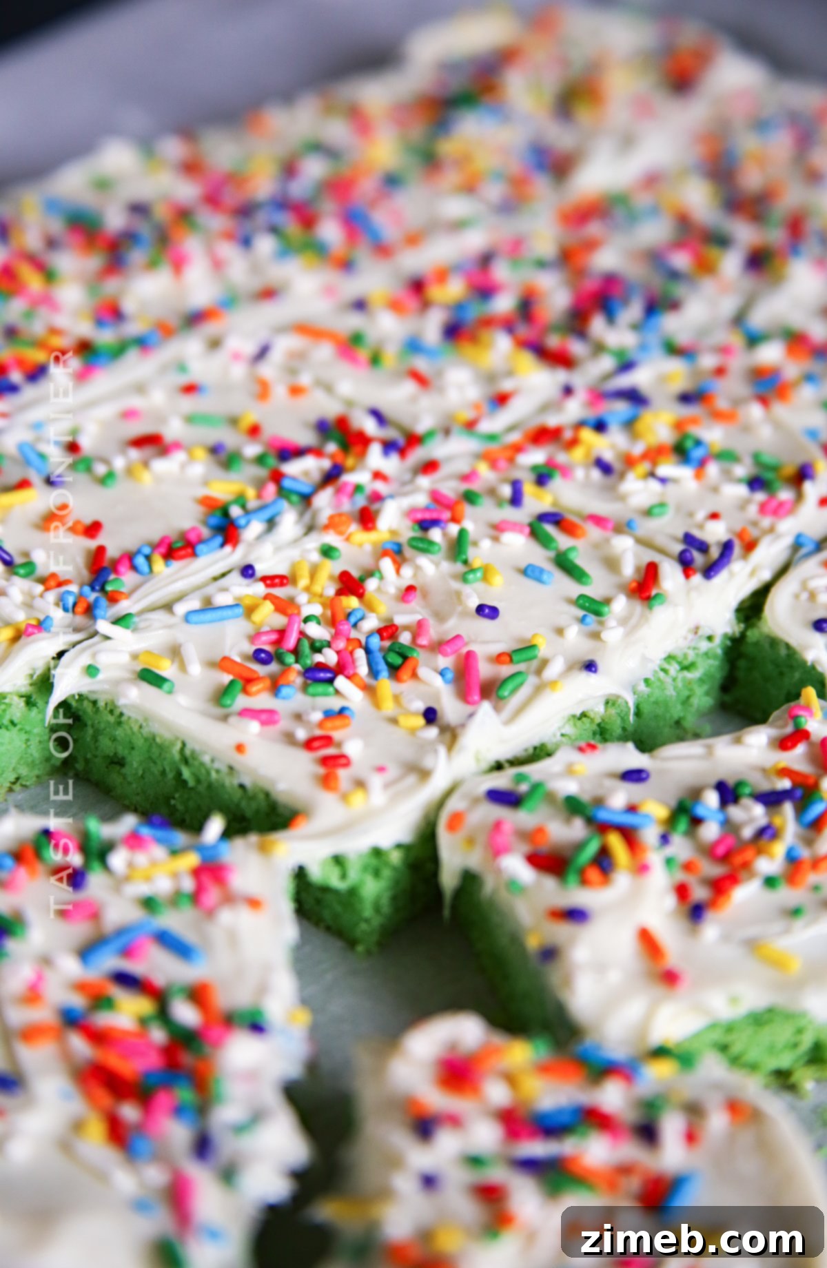 Lucky St Patricks Day Cake Mix Cookie Bars 8 A batch of rainbow sprinkle dessert bars.