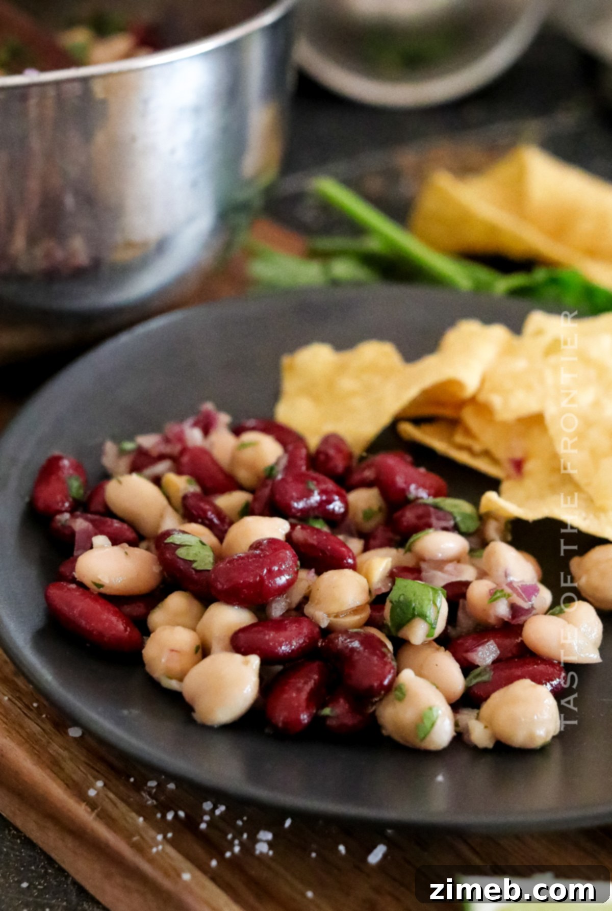 An old fashioned Three Bean Salad, evoking classic home-cooked meals and tradition.