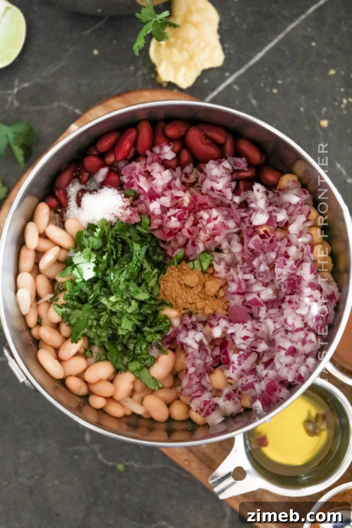 A vibrant 3 bean salad recipe ready to be served, highlighting its fresh ingredients and inviting colors.