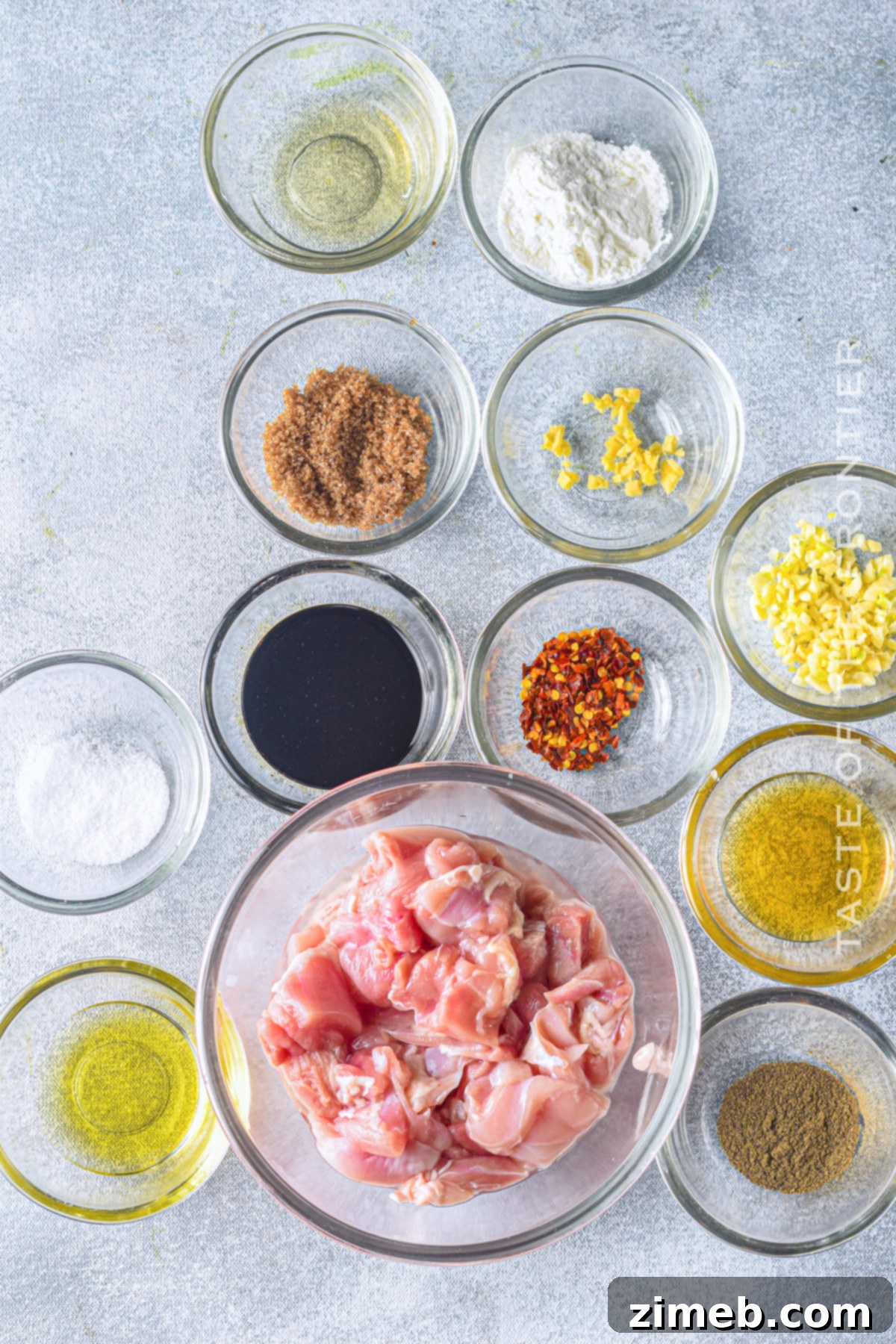 Ingredients for Instant Pot Teriyaki Chicken, including soy sauce, honey, ginger, and chicken thighs.