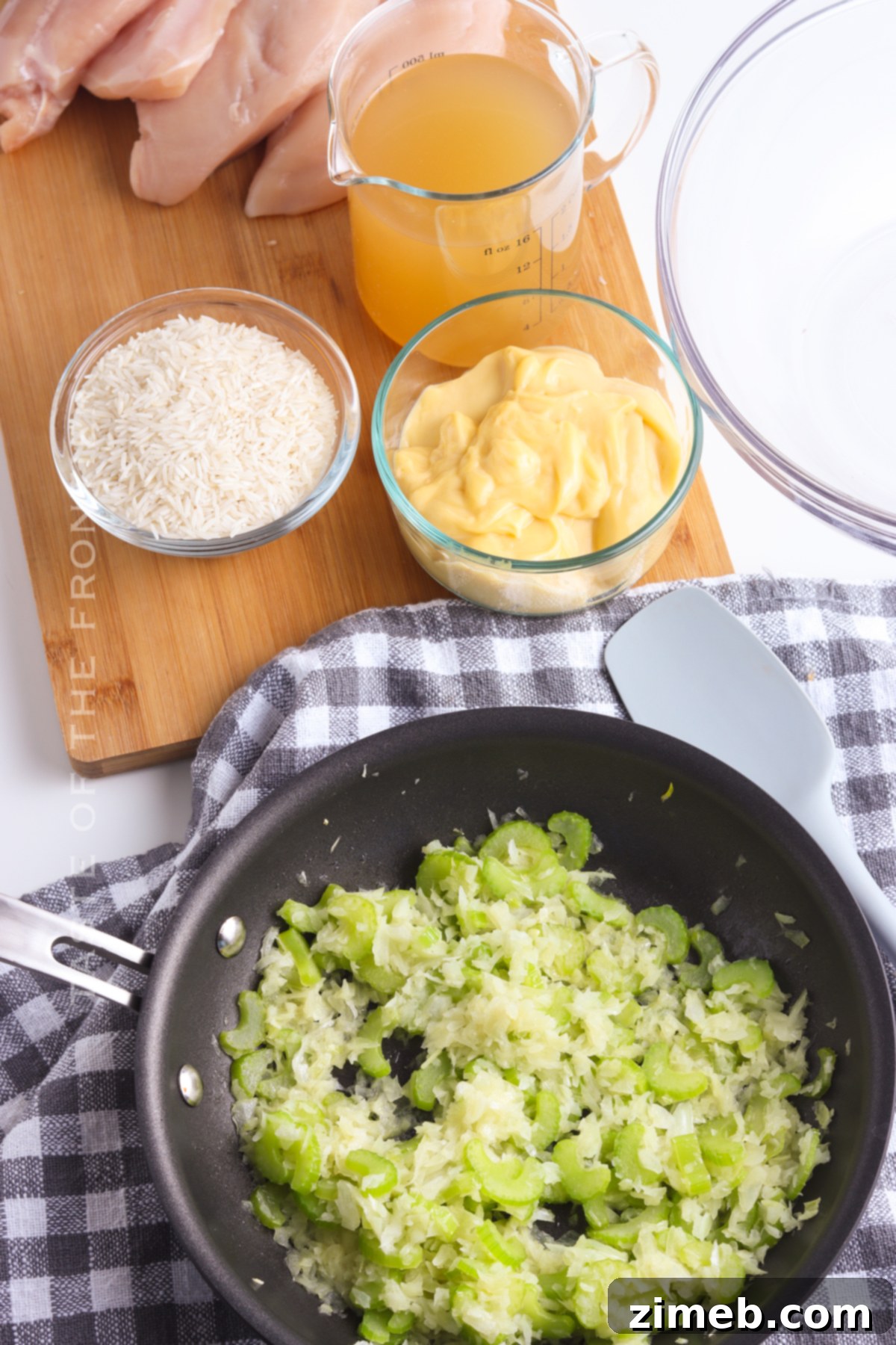 Preparing the vegetables and rice for a homemade casserole.