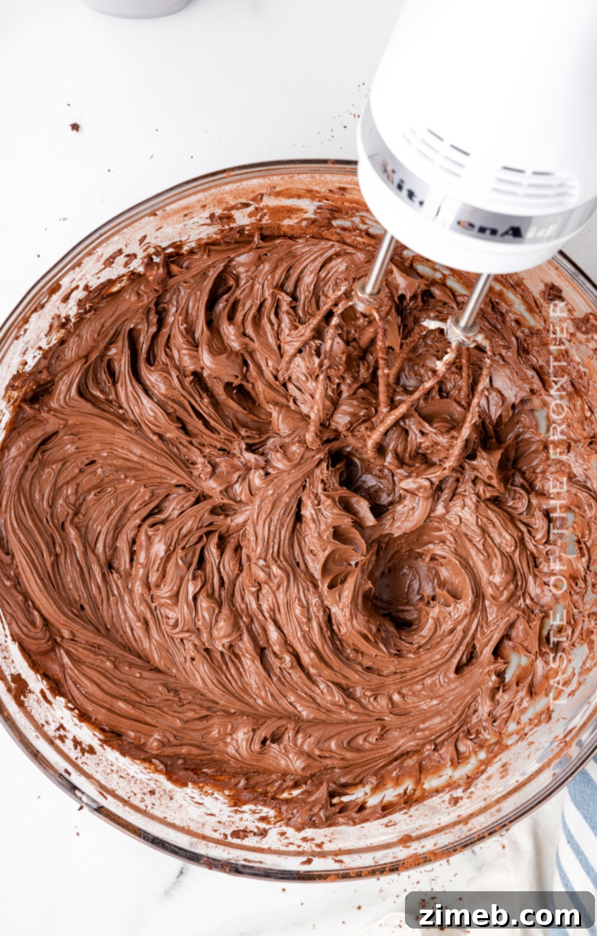 Making creamy chocolate frosting at home