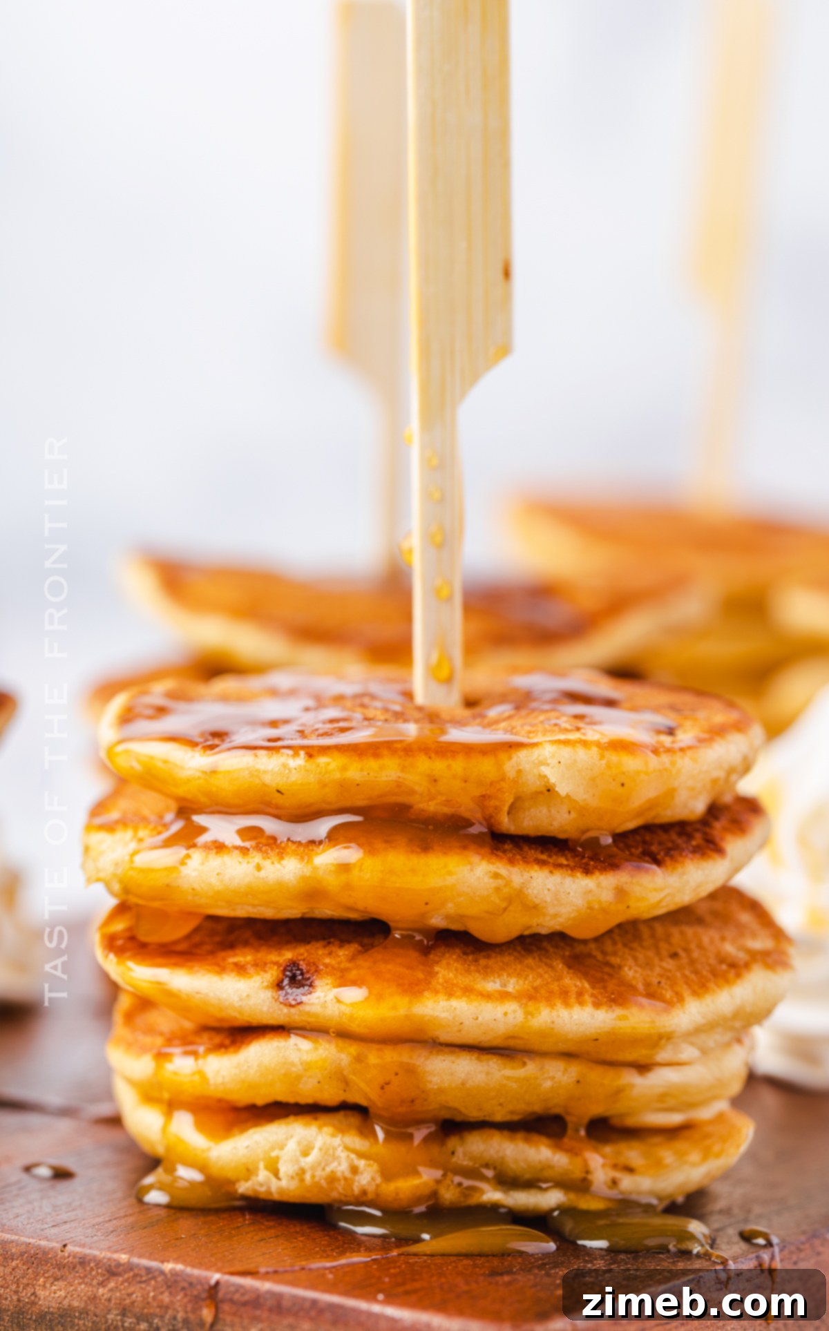 Silver Dollar Stacks 4 stack of banana pancakes with caramel