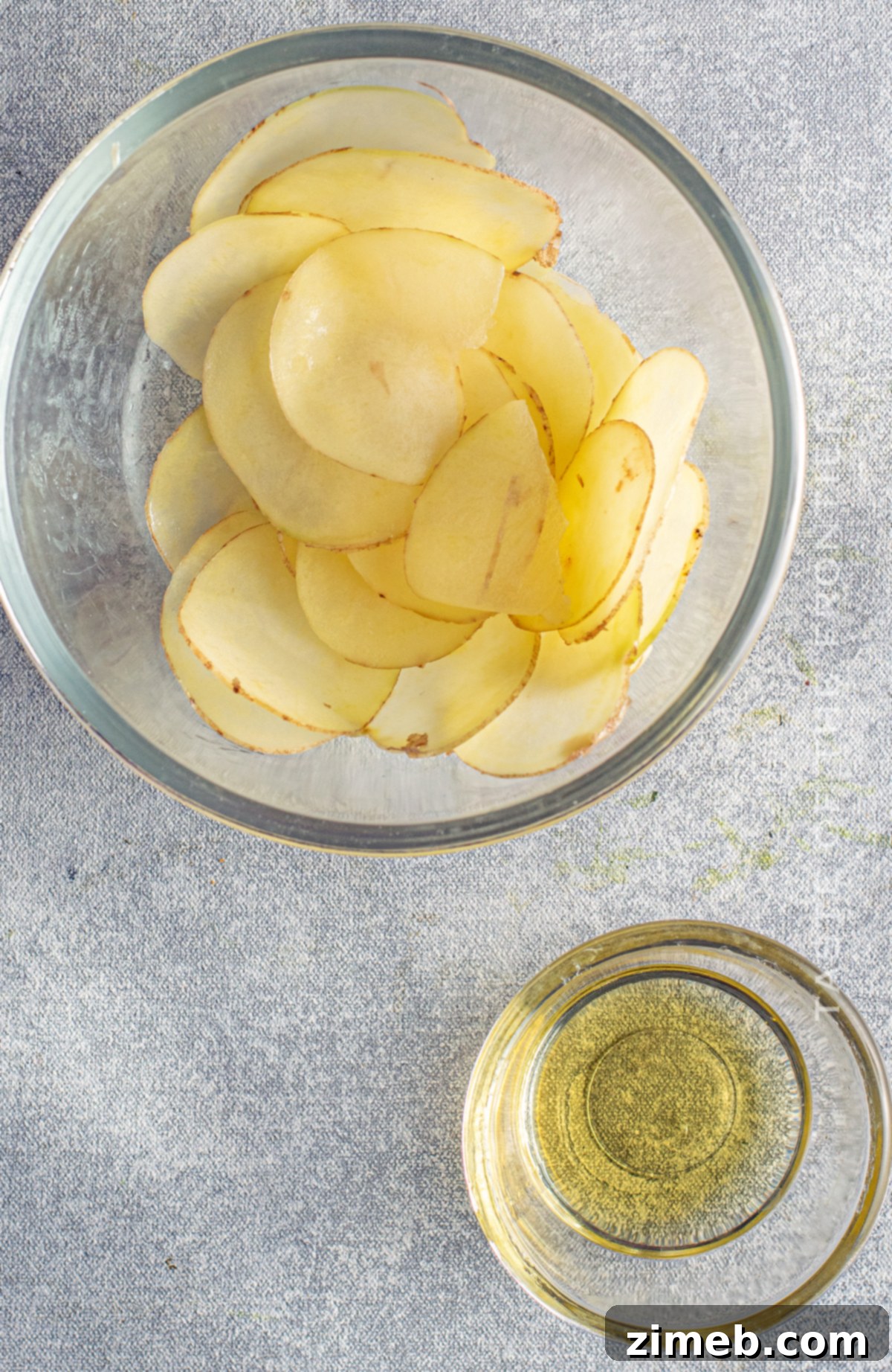Crispy Air Fryer Potato Chips 9 adding the oil