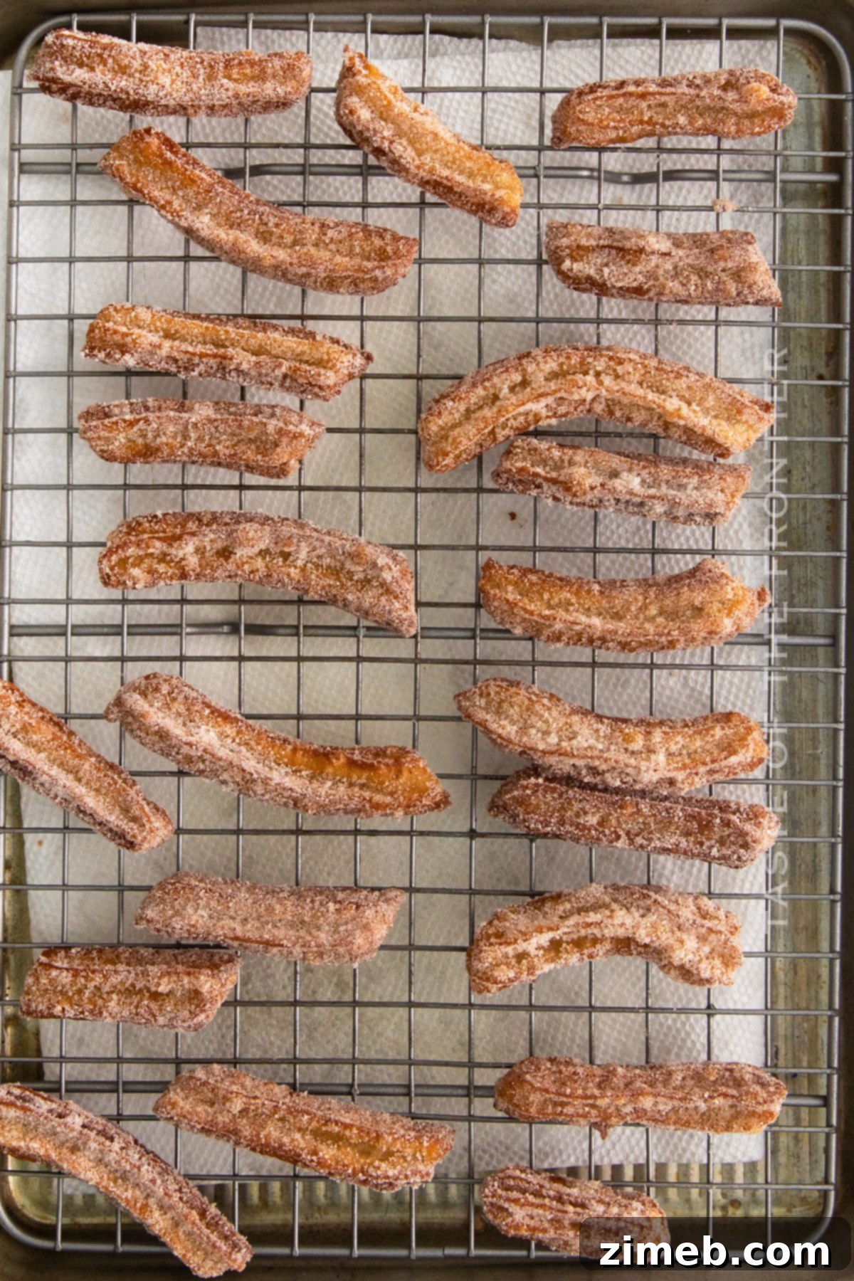 Homemade Churro Perfection 7 Freshly fried churros with a perfect golden-brown crisp, coated in cinnamon sugar.