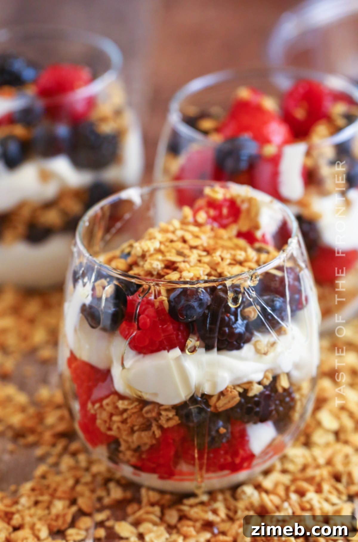 Premium Layered Dessert Glasses 9 A beautifully layered breakfast yogurt parfait, showcasing its refreshing appeal.