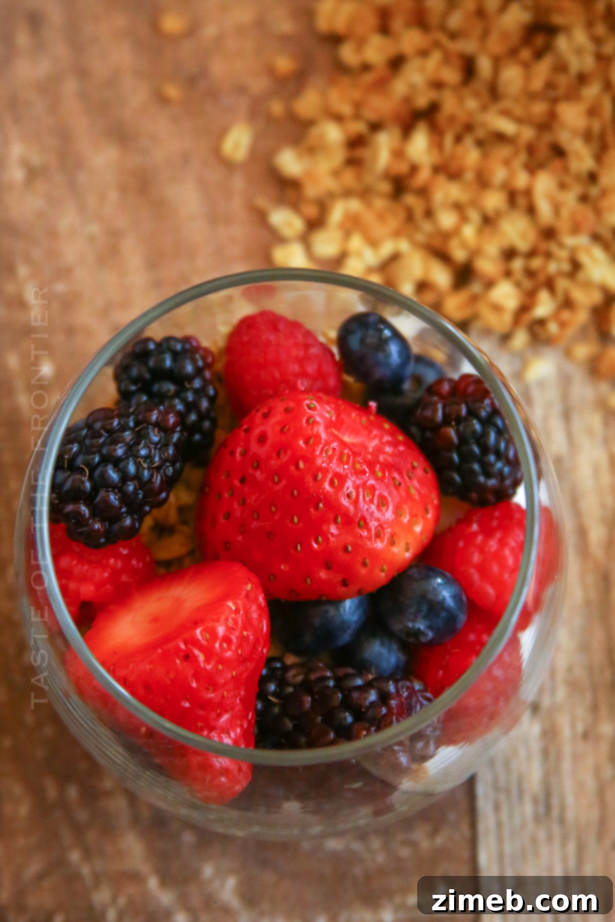 Premium Layered Dessert Glasses 6 A vibrant bowl of fresh yogurt topped with mixed berries, a foundational parfait element.
