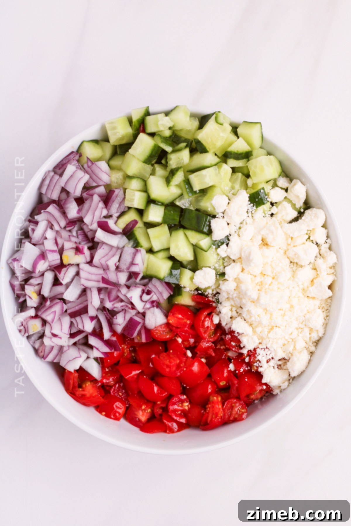 Crisp Cucumber Tomato Feta Salad 6 how to make Cucumber Tomato Feta Salad