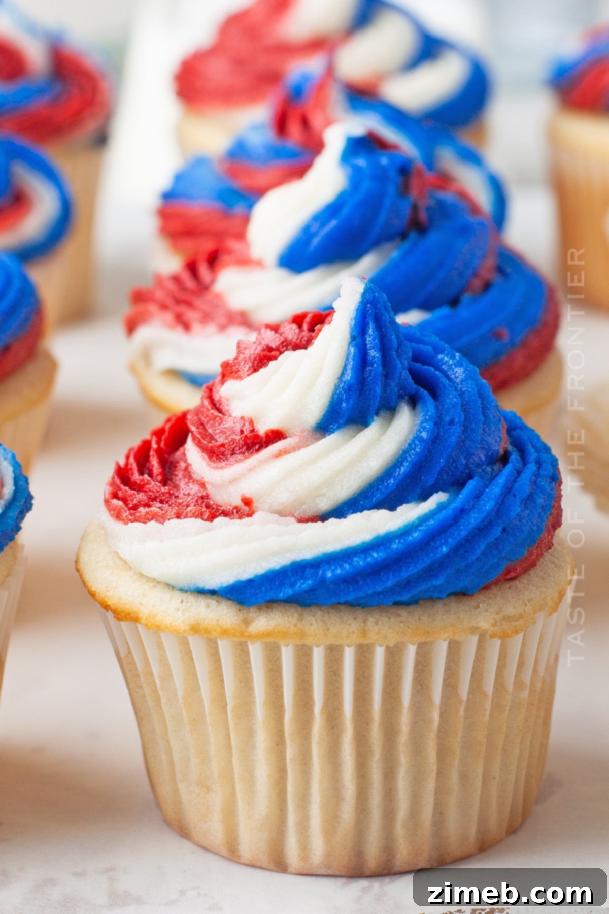 Patriotic Bites 2 Red White, and Blue Cupcakes for Fourth of July or Memorial Day celebrations.