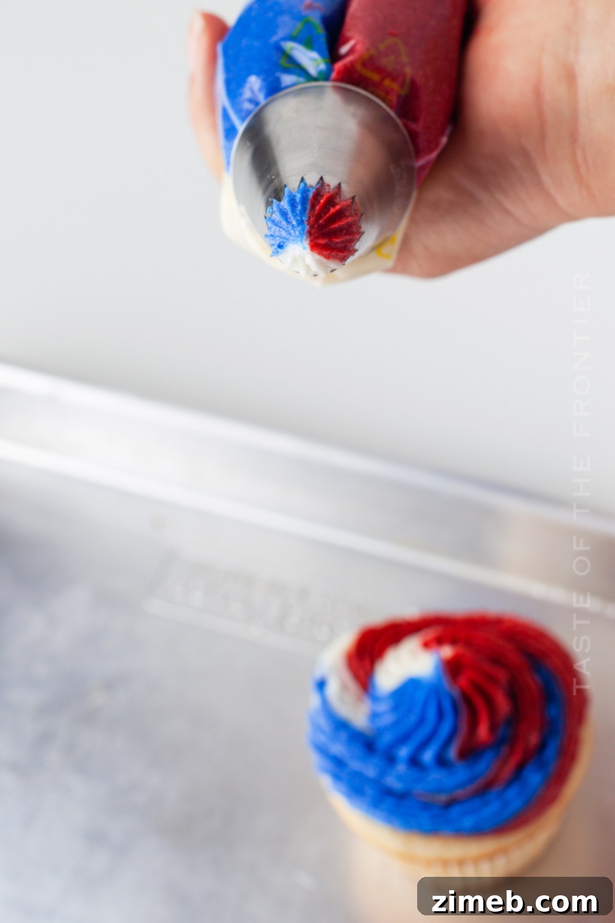 Patriotic Bites 13 Piping Swirled Frosting Colors onto cupcakes.
