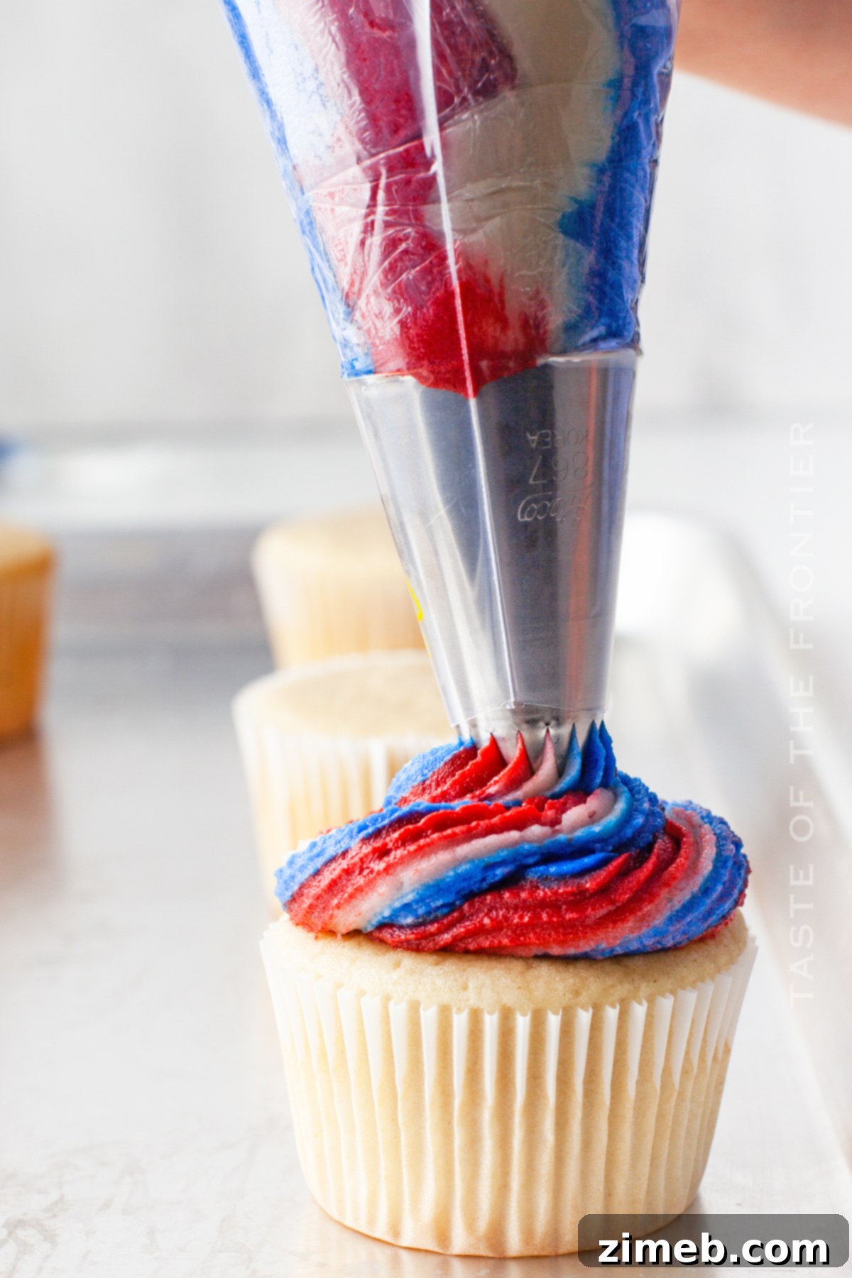 Patriotic Bites 14 Color swirled frosting on delicious cupcakes.