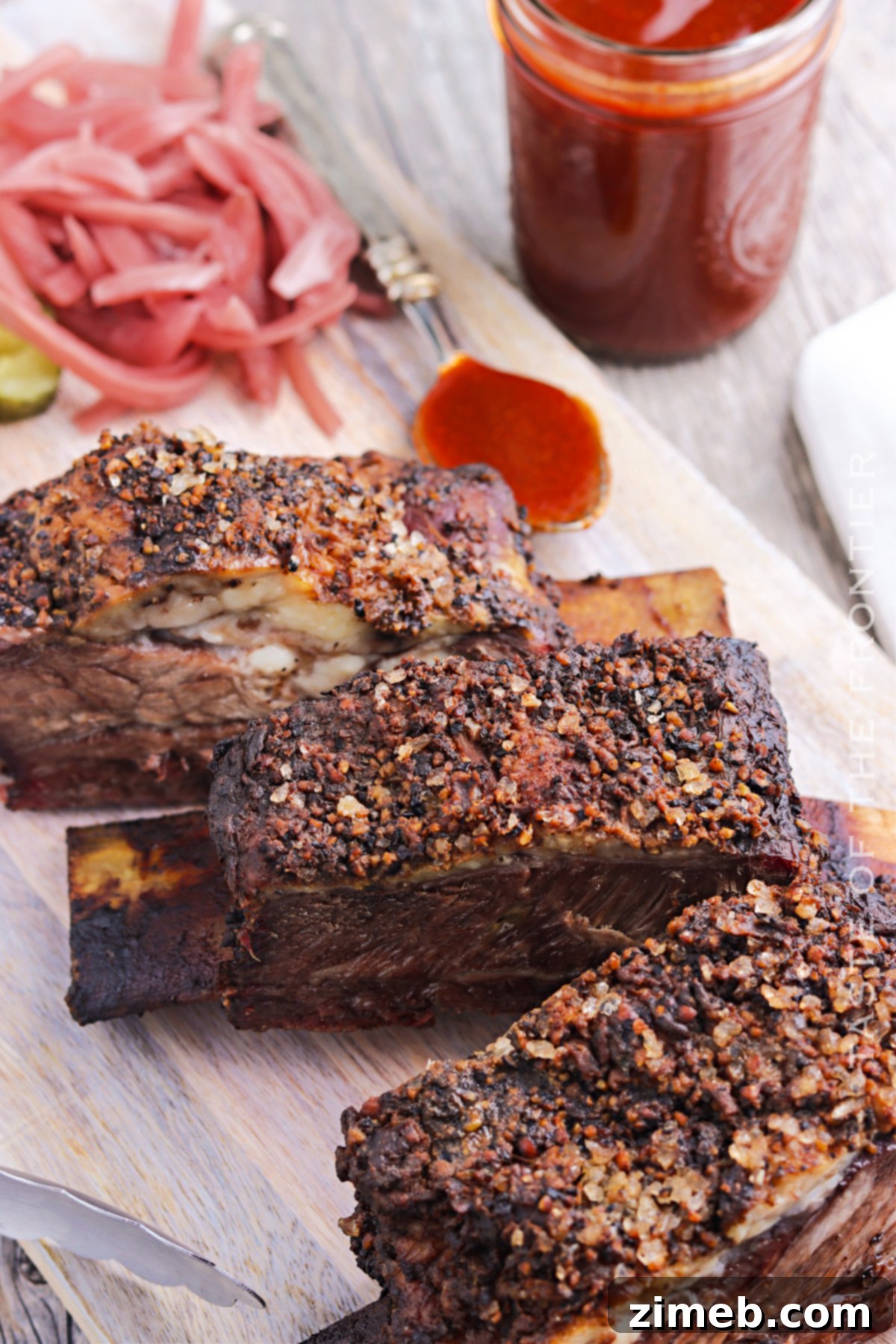 Tender smoked beef ribs on a cutting board