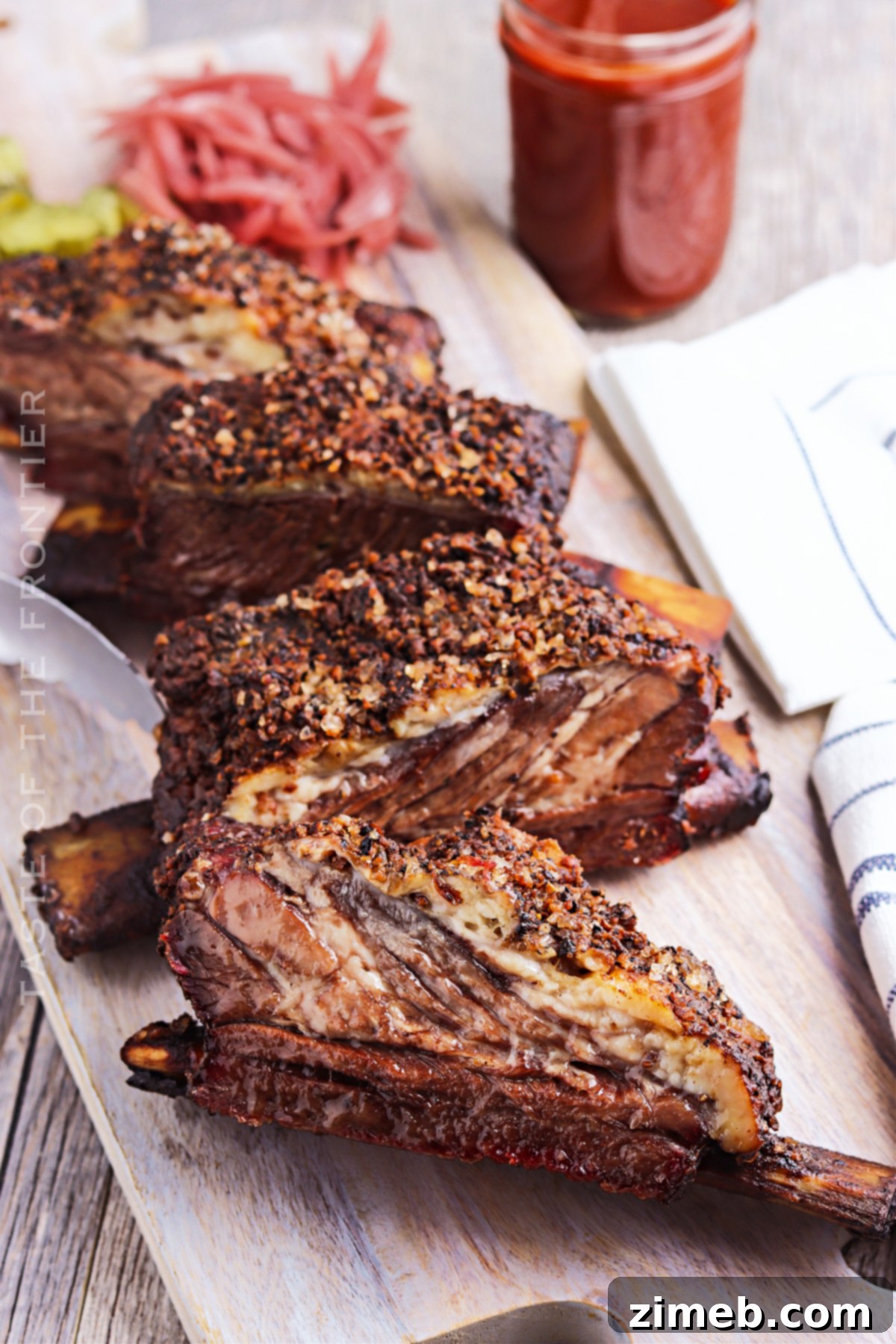 Delicious BBQ smoked beef ribs on a rack