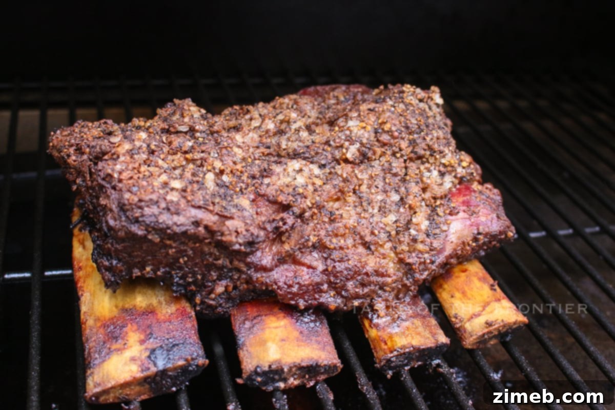 Cooked beef ribs resting on a cutting board