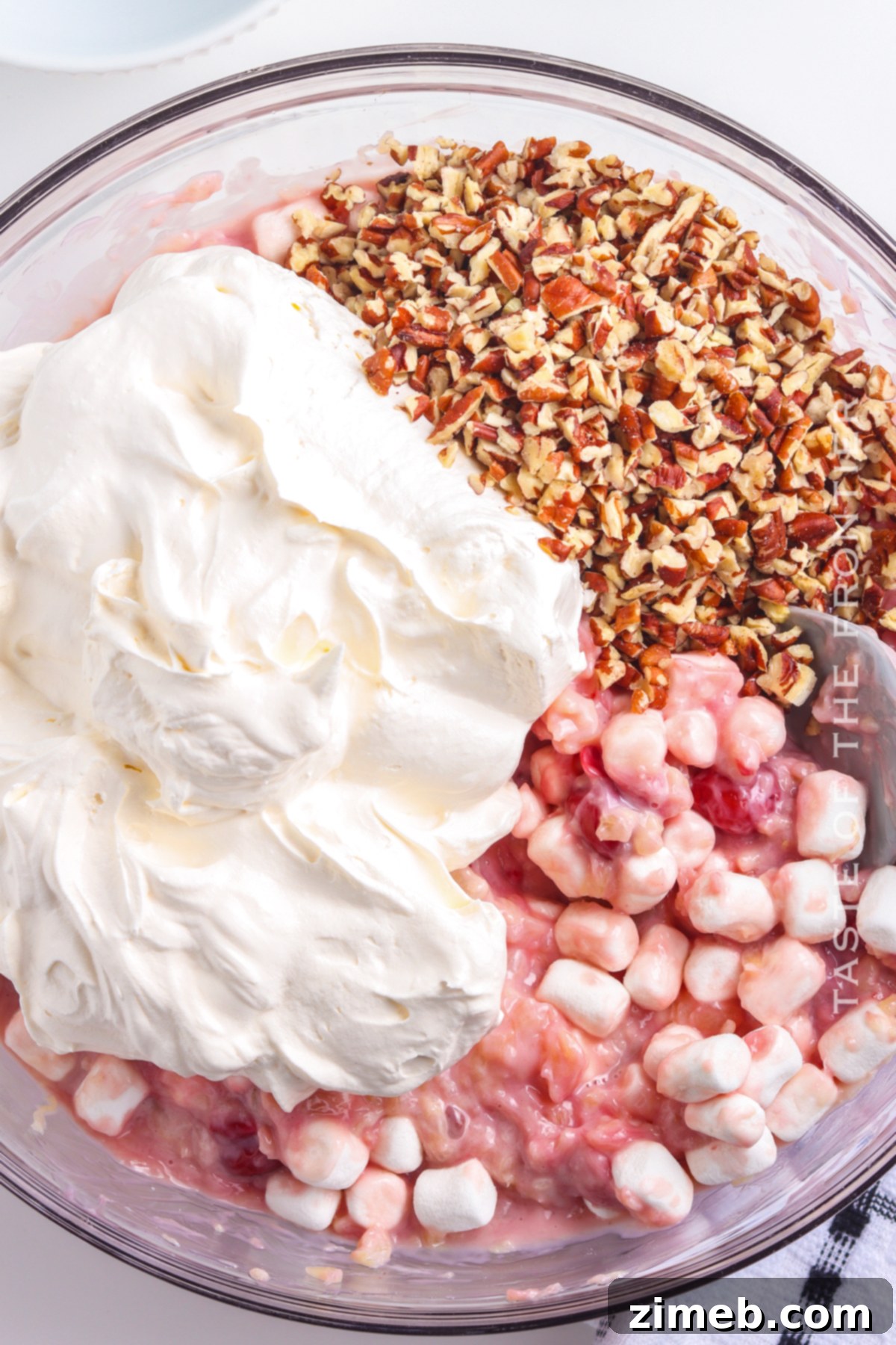 Crimson Cloud 7 Cherry Fluff with whipped cream, nuts, and marshmallows