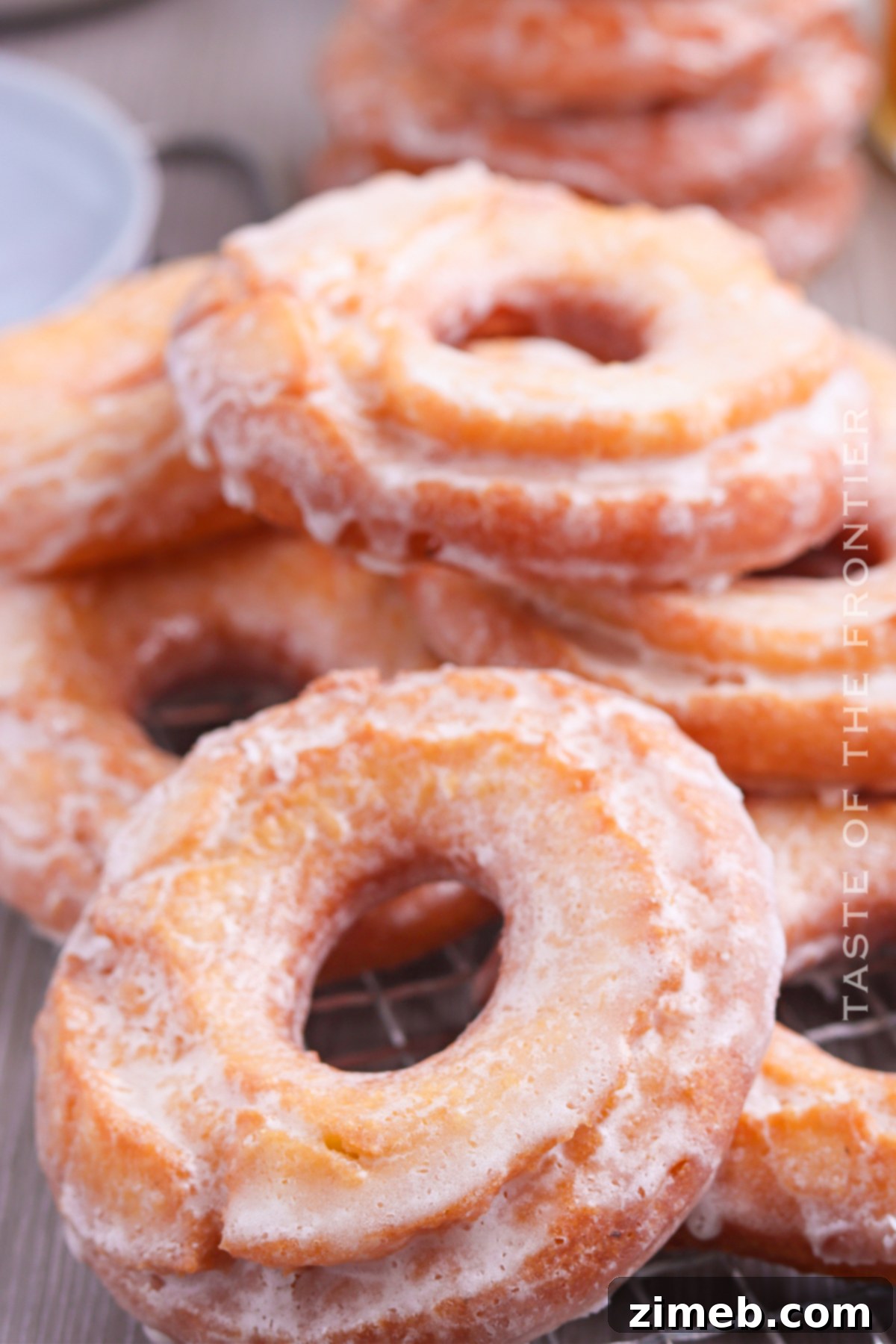 Grandma's Sour Cream Donuts 19 A plate of perfectly glazed Old Fashioned Sour Cream Donuts