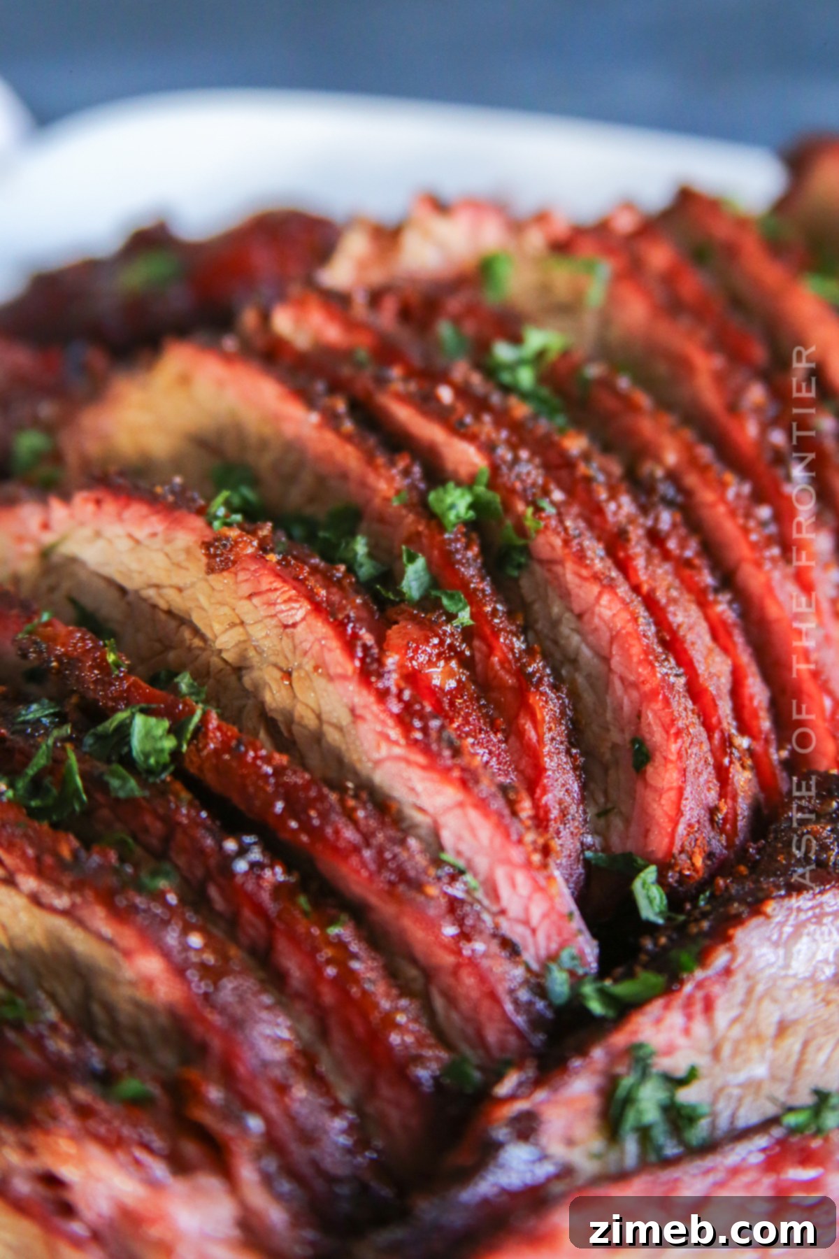 Sliced Beef Roast showing the tender, juicy interior and smoke ring.
