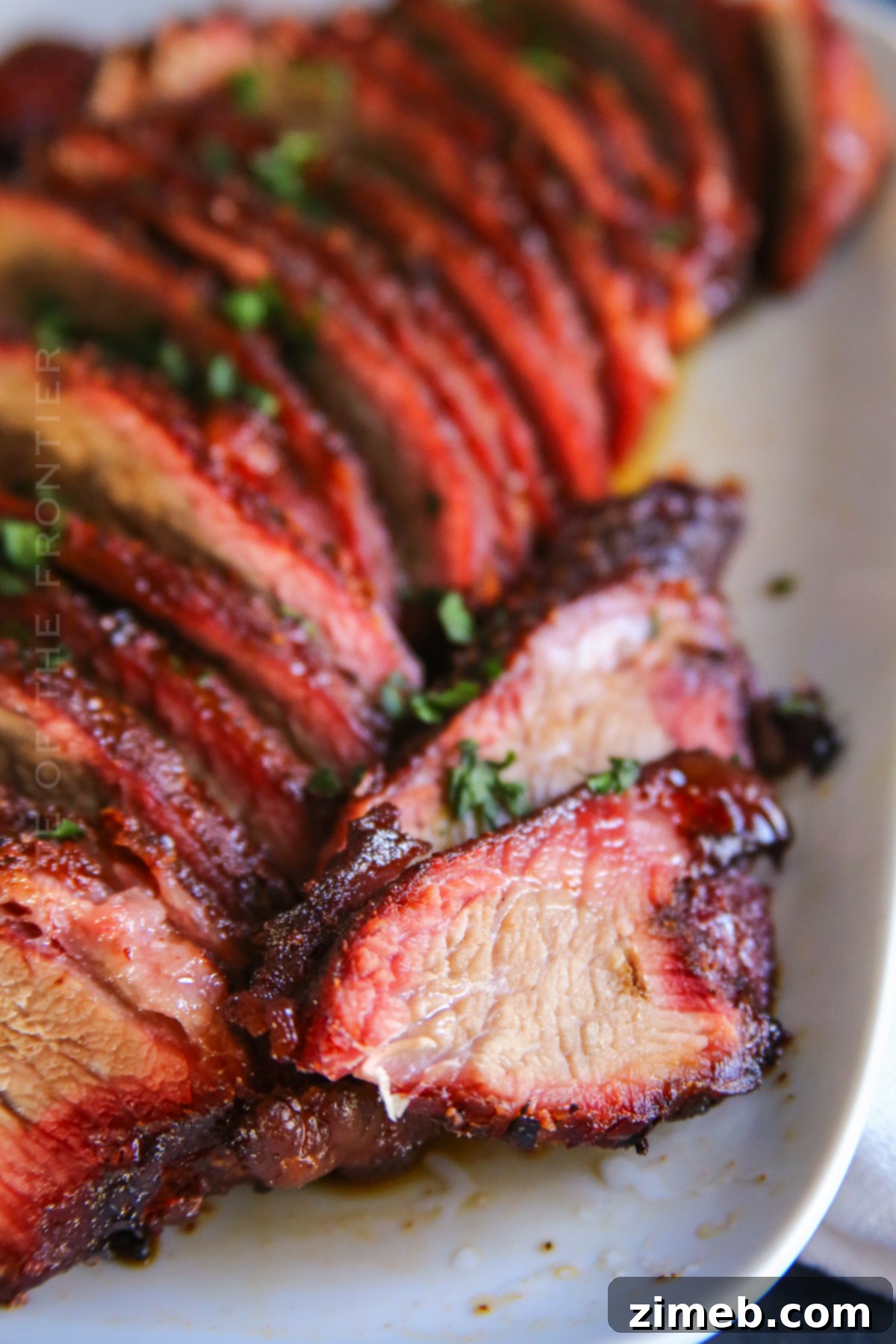 Smoked Sirloin Tip Roast on a Traeger grill, showcasing a perfect smoke ring and tender texture.