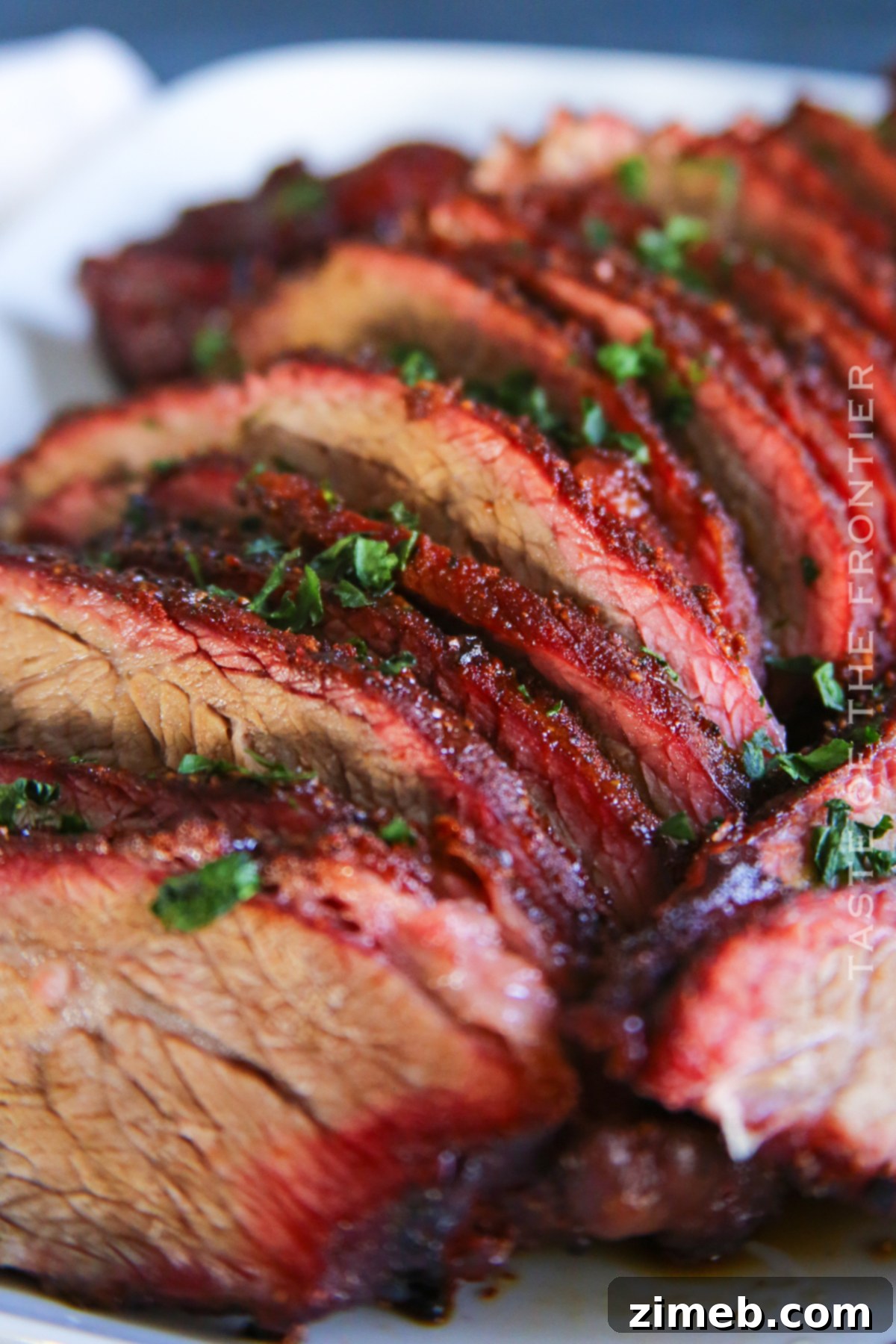 Smoked BBQ Beef Dinner, showing sliced tri-tip roast, ready to serve.