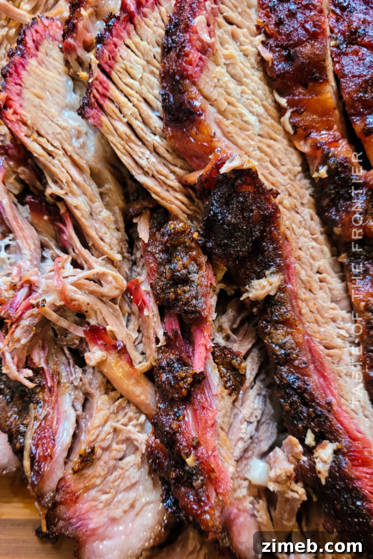 Slow-Smoked Brisket Perfection 20 Close-up of juicy Smoked Brisket slices, revealing the smoke ring.