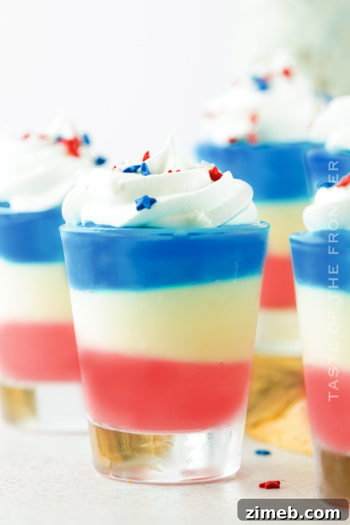 Boozy Pudding Delights 3 Close-up of Cheesecake Pudding Shots, highlighting the creamy texture and delicious flavor, ready for adult parties.