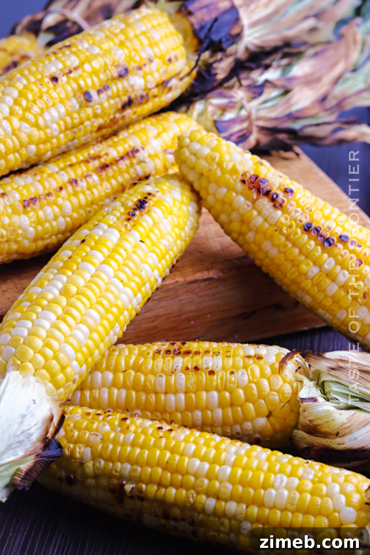 Deliciously Simple Grilled Corn 3 Grilled Corn without husks showing perfect char marks