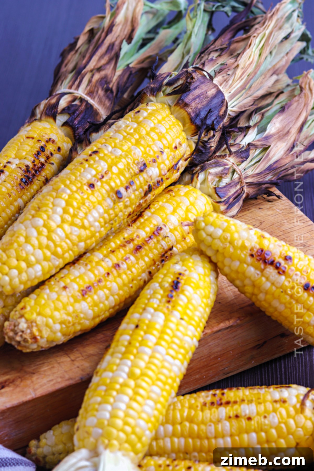 Deliciously Simple Grilled Corn 14 Close-up of a side dish of bbq corn on the cob