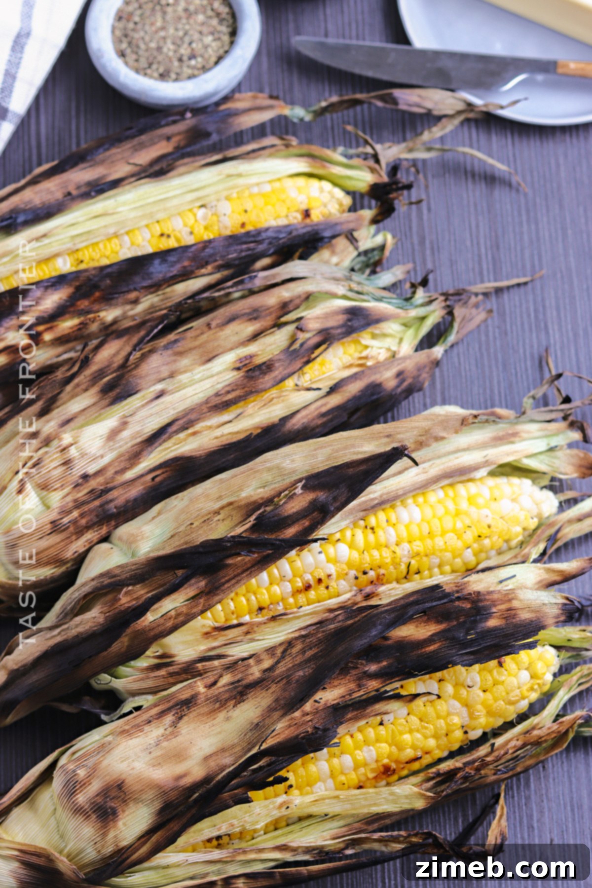 Deliciously Simple Grilled Corn 4 Close-up of perfectly grilled corn with barbecue flavor