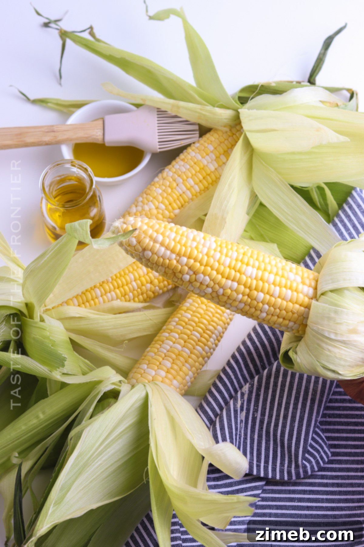 Deliciously Simple Grilled Corn 10 Seasoning corn on the cob before grilling without husks