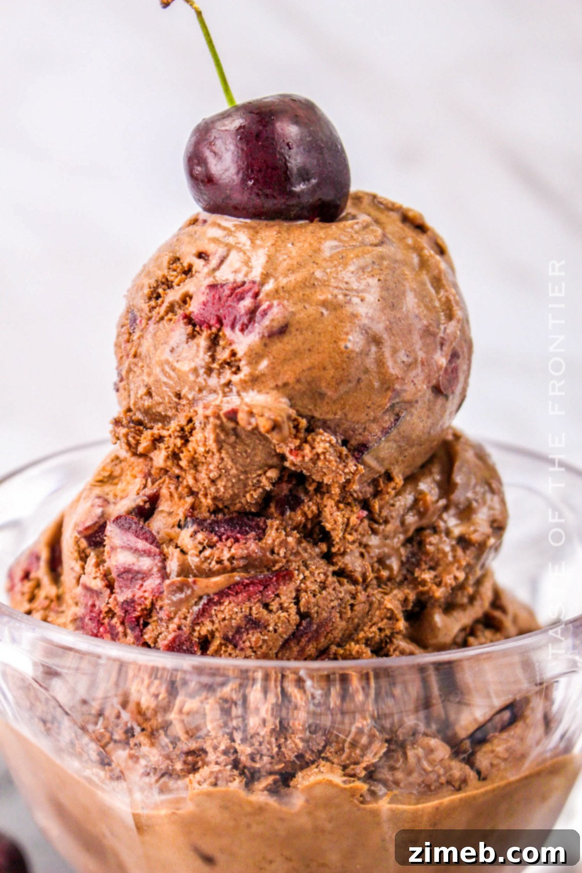 chocolate ice cream sundae with cherries