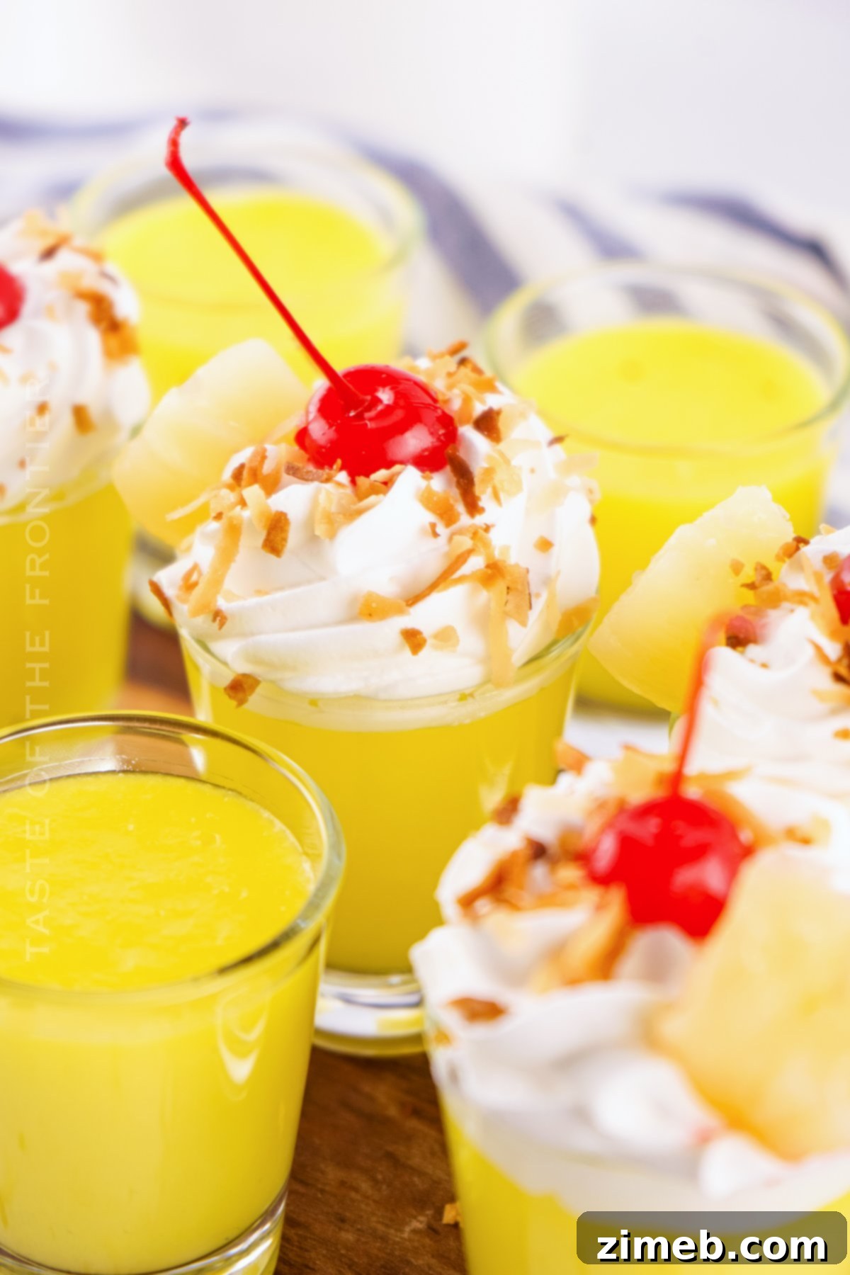 Pineapple garnish on Piña Colada Pudding Shots