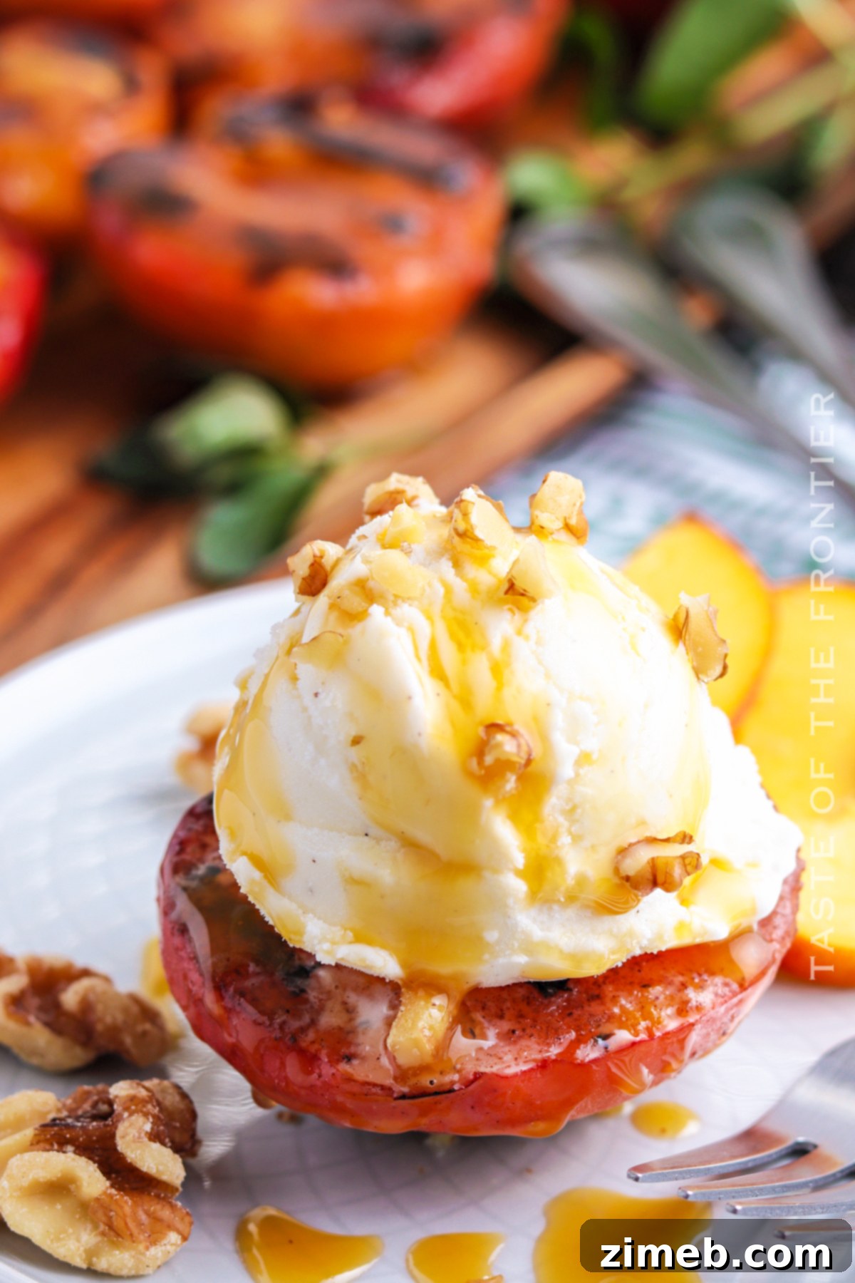 serving a peach with ice cream