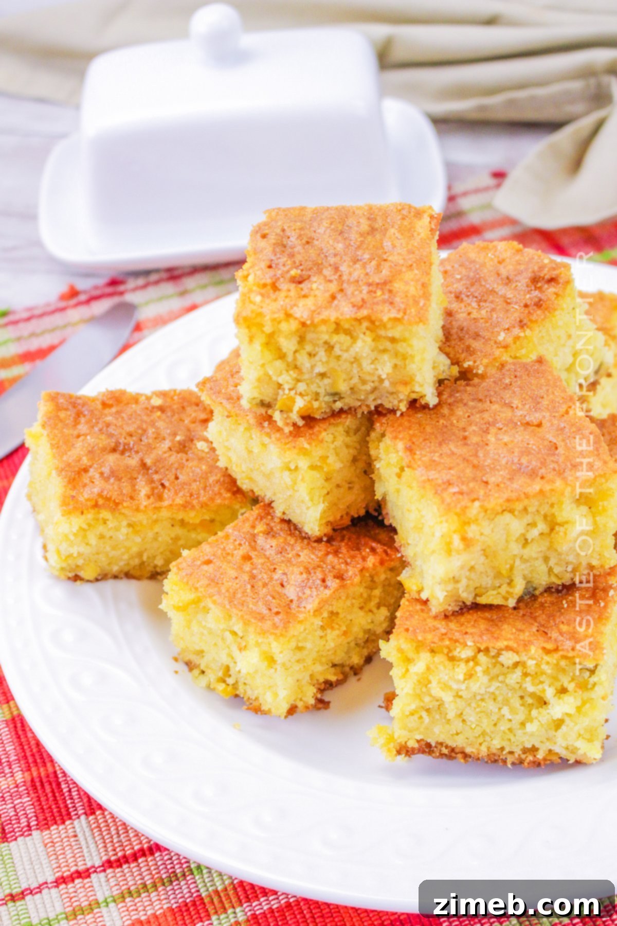 Spicy Mexican Cornbread 8 Mexican Cornbread with creamy corn visible, highlighting moisture