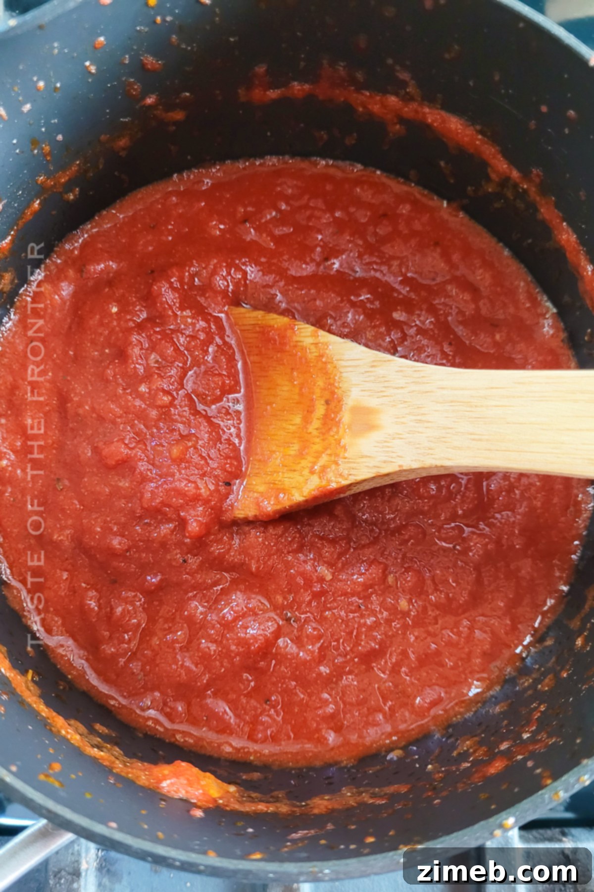 Simmer tomato sauce